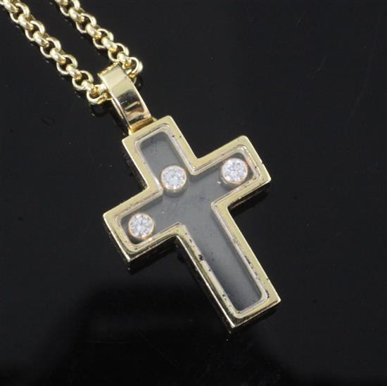 A Chopard Happy Diamond glass-panelled cross pendant,